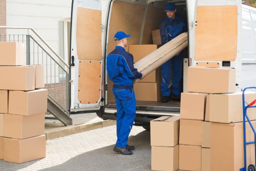 Man and van removals team working in a residential street in Crewshill