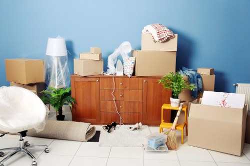 Careful unloading of furniture and appliances at a property in Crewshill