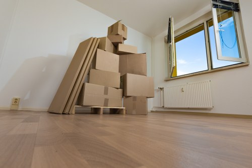 Careful loading of household items for a move in Crewshill
