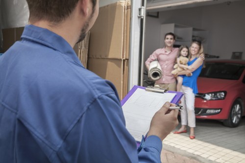 Moving van and household items outside a Crewshill property