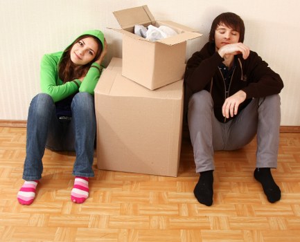 Local movers preparing boxes for a property in Crewshill