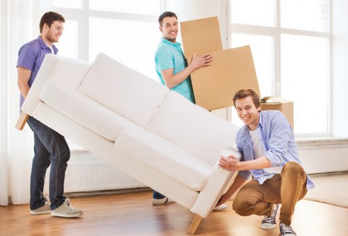 Packed office equipment ready for a commercial move in Crewshill