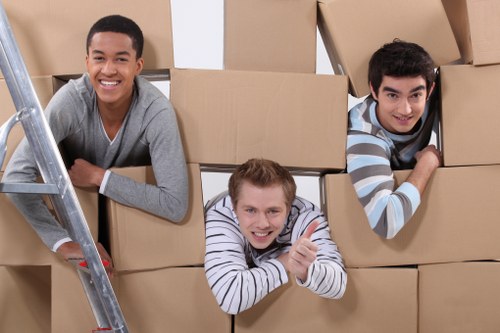 Removal van and moving crew preparing for a service booking