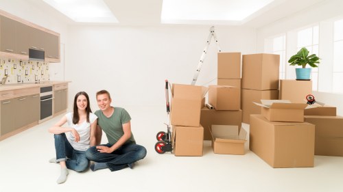 Local removal company preparing boxes and furniture for transport