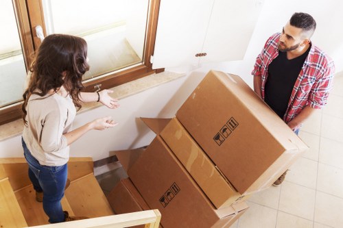 Packed boxes and furniture prepared for a local home removal